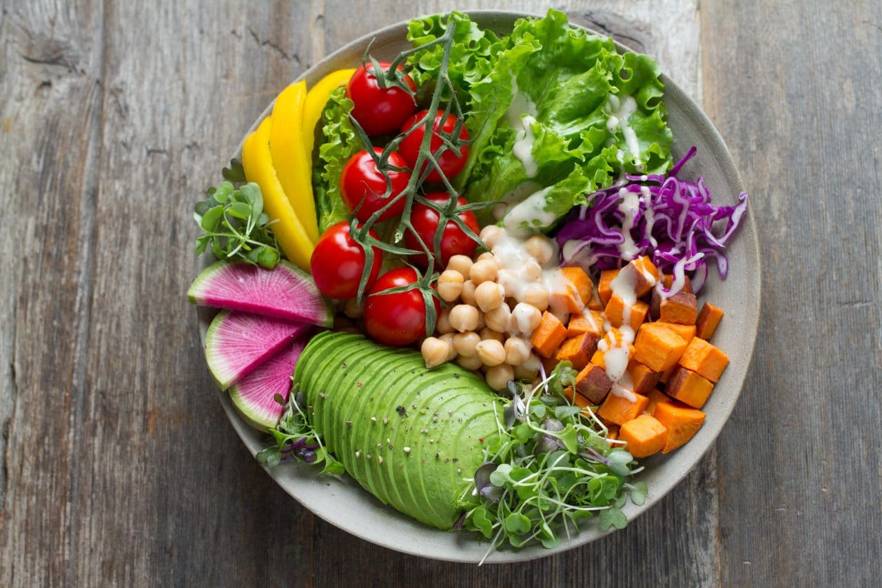 A colorful plate of healthy fruits and vegetables.