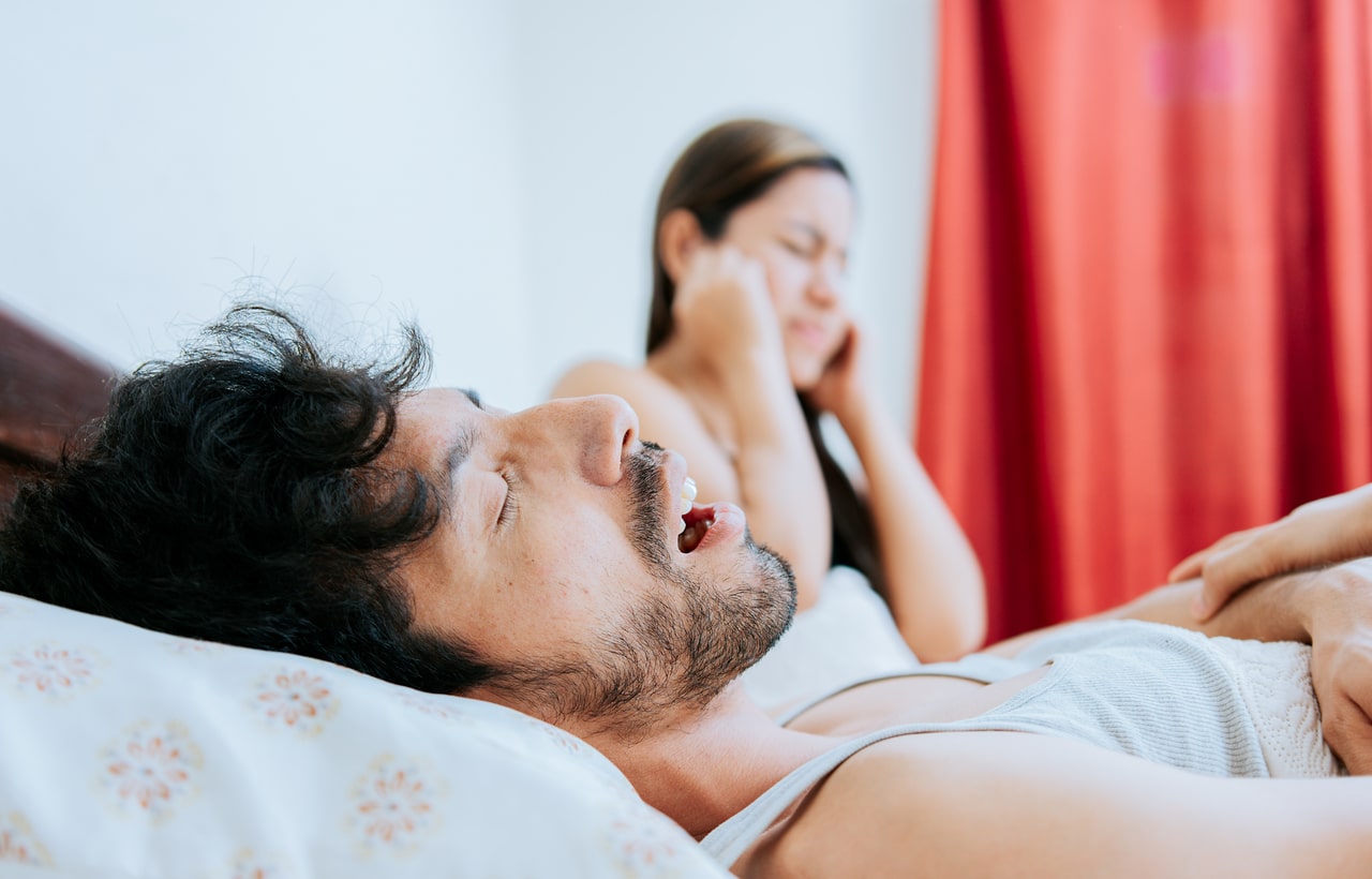 Man snoring while sleeping