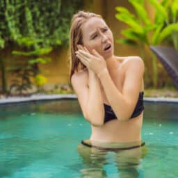 Woman in pool has water in ears
