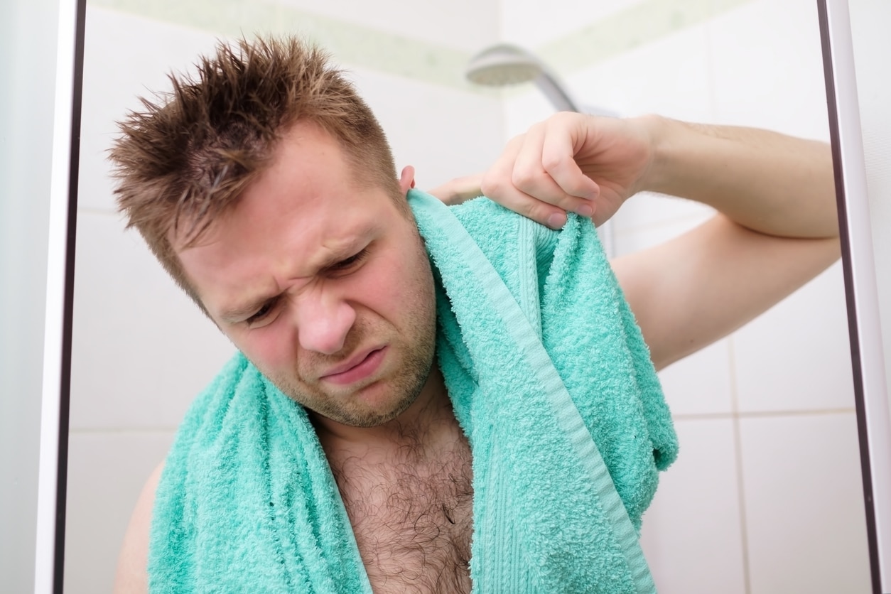 Man dries ears of water